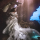 Illustration for article titled This Shark Shepherdess Looks Like She Stepped Out of an Underwater Fairy Tale